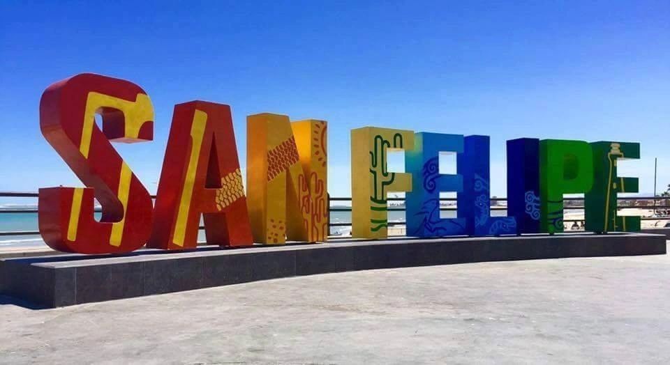 A sign that says san felice in colorful letters.